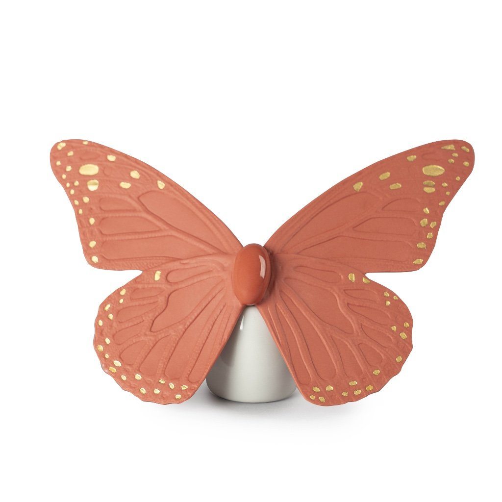 Exquisite Lladro Porcelain Butterfly Figurine with Golden Luster and Coral Hues