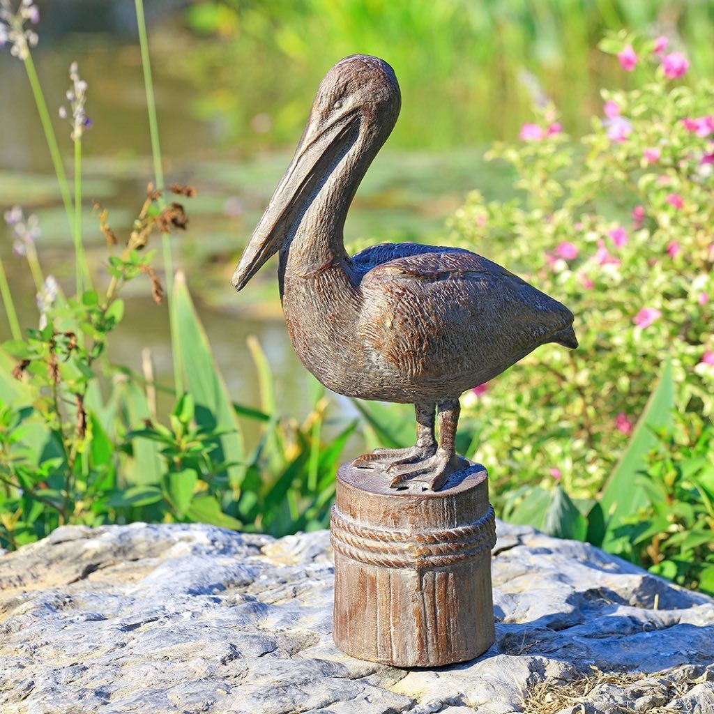 SPI Garden Decorative Feathered Fisherman Pelican Sculpture for Outdoor Gardens