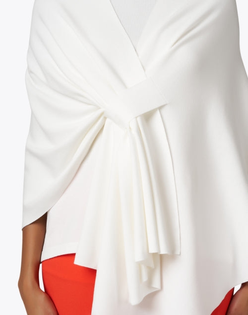 Stylish White Knit Wrap with Tab Closure for Cooler Weather