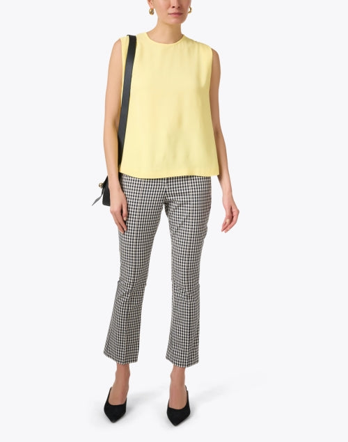 Stylish Seventy Yellow Sleeveless Women's Blouse Top