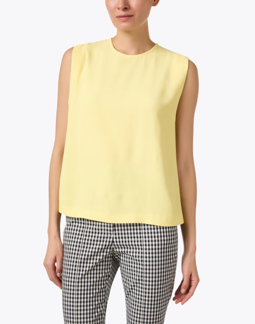Stylish Seventy Yellow Sleeveless Women's Blouse Top