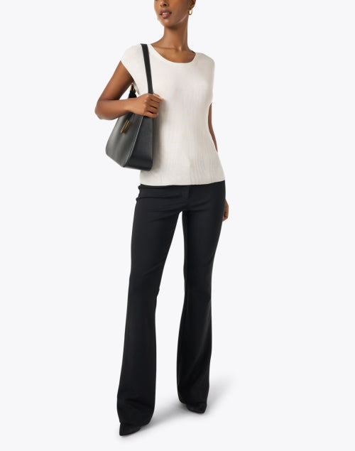 Stylish White Ribbed Knit Top with Classic Cap Sleeves