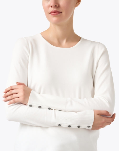 Ivory-colored Knit Crew Neck Top with Button Detailing on Cuffs