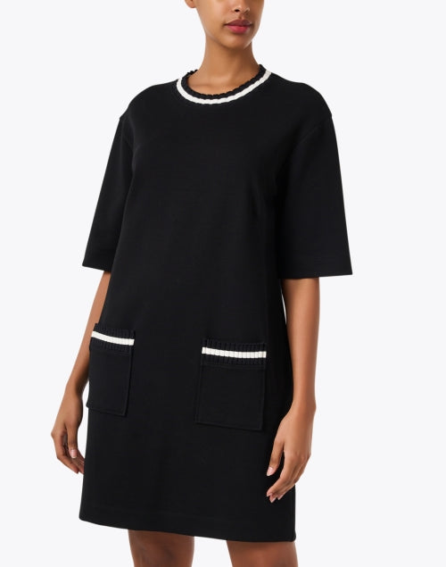 Marc Cain Sport's Stylish Black Knit Dress with Contrasting White Trim and Pockets
