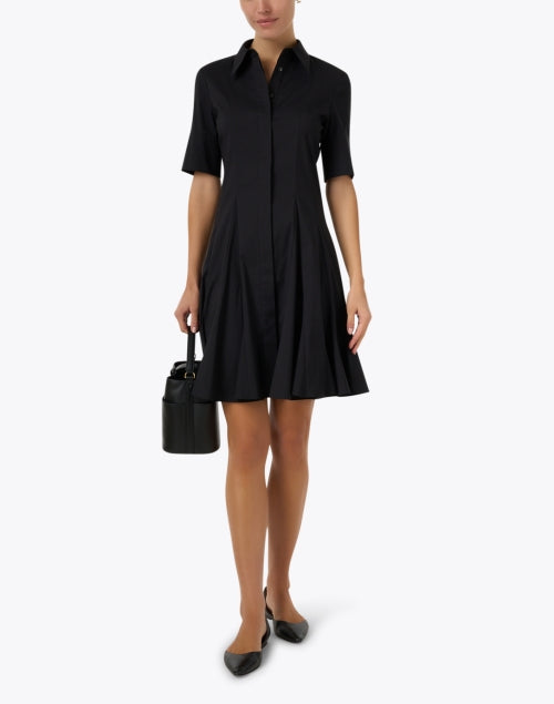 Compact Black Leather Crest Bag for Stylish Modern Women