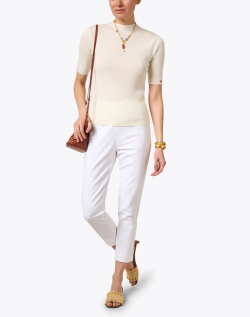 Stretchable White Cotton Lucy Pants for Women's Fashionable Bottoms