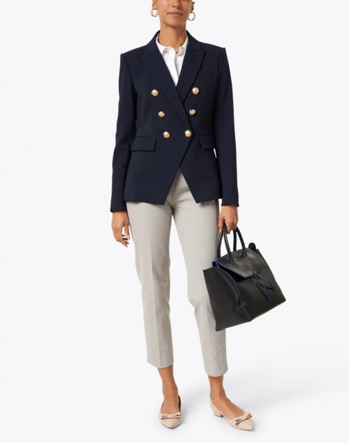 Navy Miller Dickey Jacket with Decorative Gold Crest Buttons - A Stylish Outerwear Piece