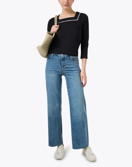 Frame's Medium Wash Ultra Wide Leg Stretch Denim Le Slim Palazzo Jeans for a Trendy Look