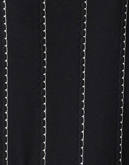 Stylish Black Knit Top with Stitched Striped Details