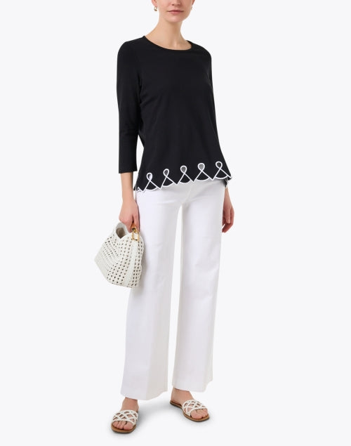 Stylish Black Pima Cotton Knit Top with Embroidered Hem and Eyelet Cutouts