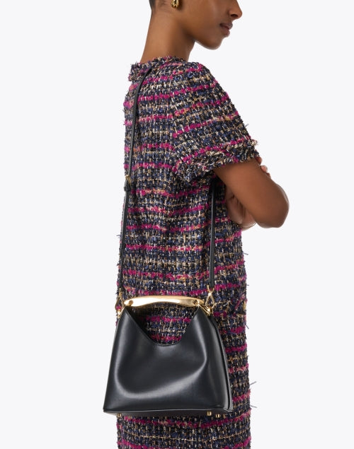 Elegant Black Leather Boomerang Bag with Gold-plated Handle