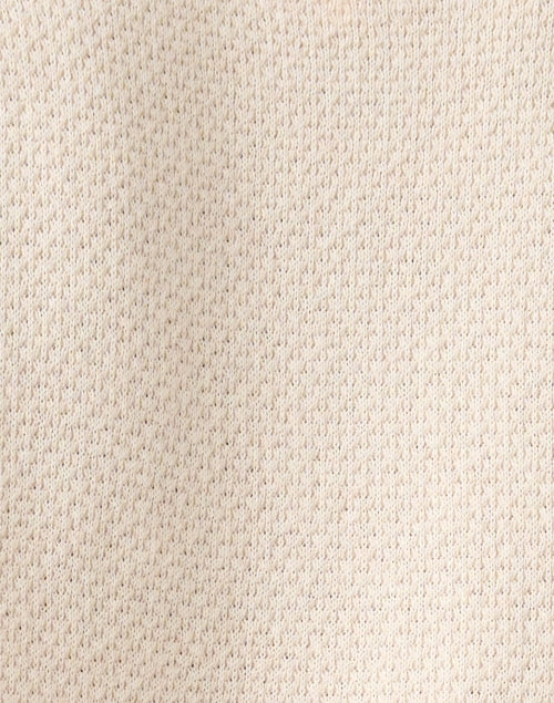 Cream-colored Knit Sweater with Playful Crocheted Cuff Links