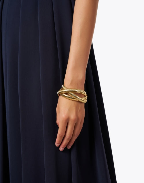 Exquisite Triple Gold Cobra-Style Bracelet for Elegant Attire