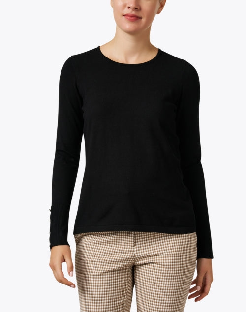 Stylish Black Knit Top with Decorative Button Cuffs