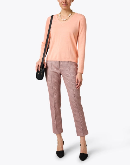 Stretchable Peach-colored Geometric Print Slim-fit Pants for a Fashionable Look