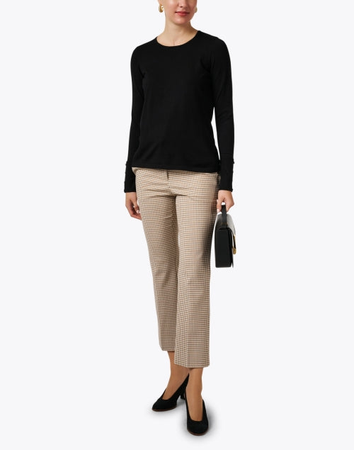 Stylish Black Knit Top with Decorative Button Cuffs
