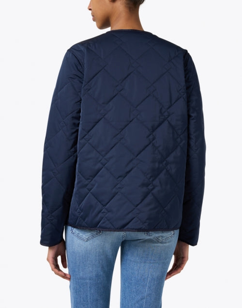 Reversible Navy and Camel Quilted Fashion Jacket for Spring Getaways
