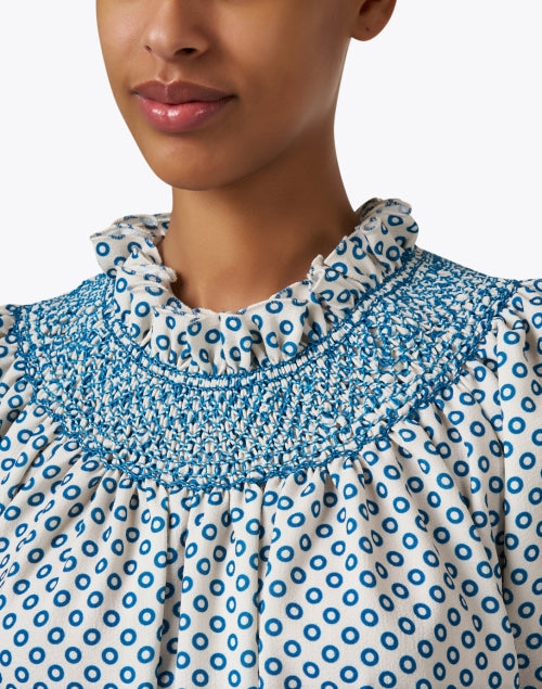 Charming Maria Blue Dotted Self - Tie Ruffle Neck Blouse