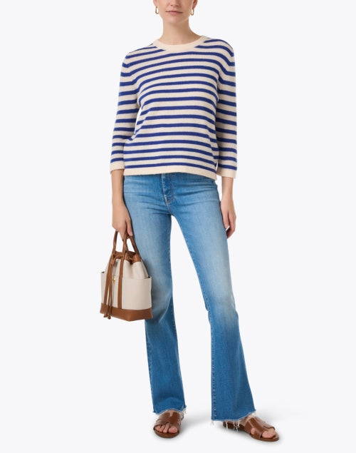 Mother's Light Blue Weekend Flare Stretch Denim Jeans - A Must - Have for Everyday Style