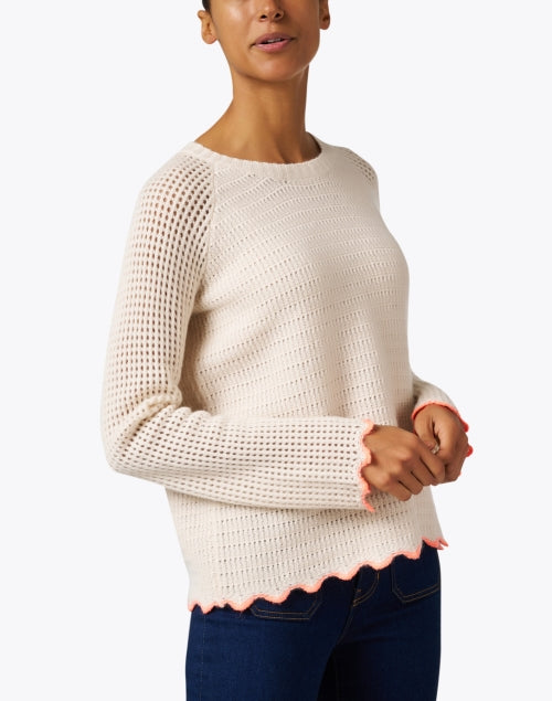 Beige Knit Sweater with Scalloped Hem for a Stylish Look